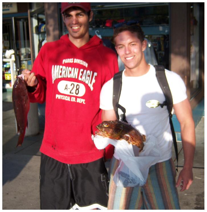 Michael and I holding up our biggest catches of the day. Michael actually won the Jackpot for Biggest Fish.